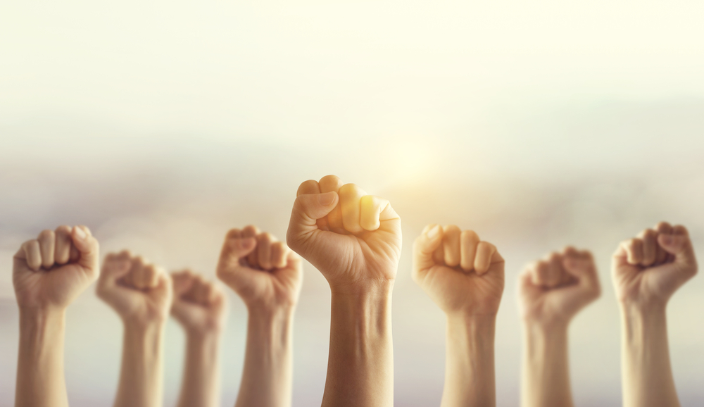 Your Revolution Won’t Come In A Headline The Content Advisory Raised Fists